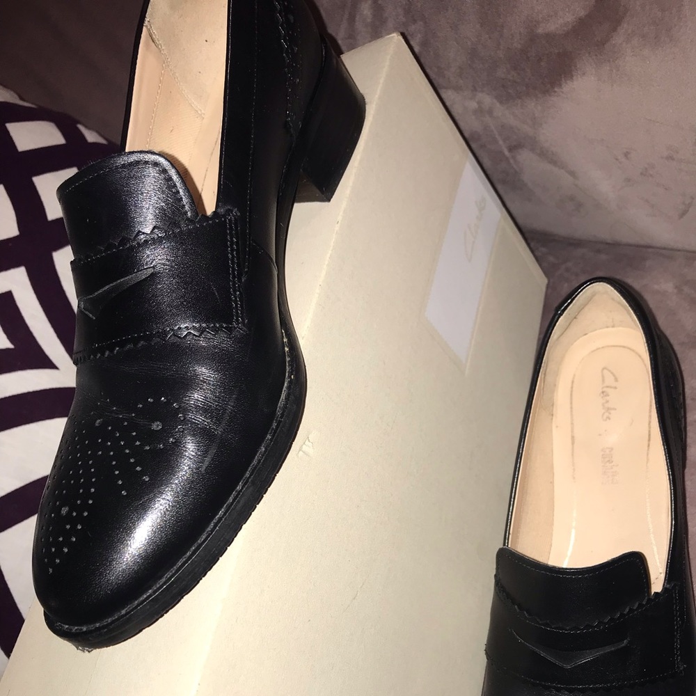 Clark’s black loafer